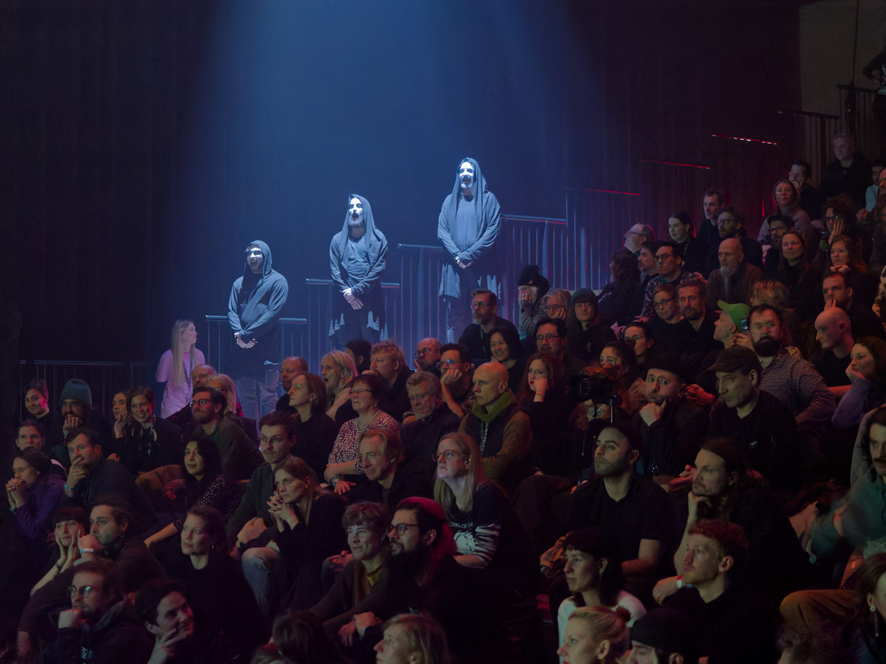 Members of the Growlers Choir pop up alongside the audience at Radialsystem