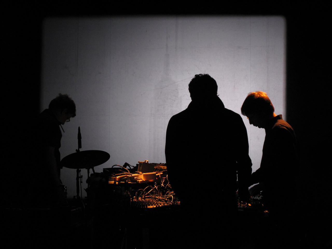 Groupshow (Hanno Leichtmann, Andrew Pekler, Jan Jelinek) perform to Andy Warhol's »Empire« at WMF, CTM 2010